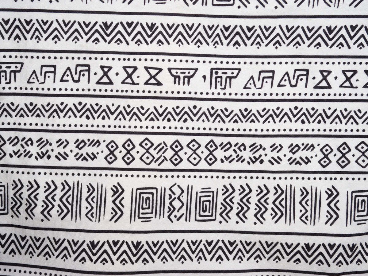 Asili print detail — mud cloth print in black on cream