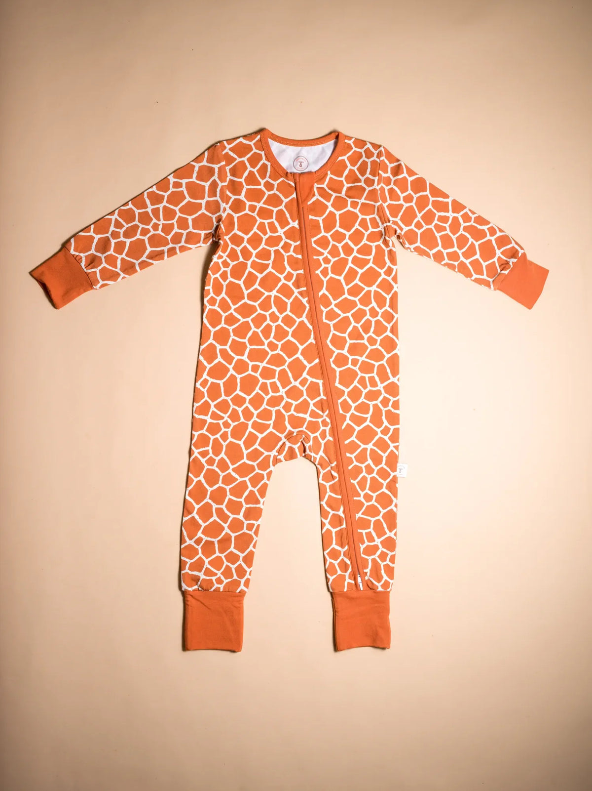 KendiKids Twiga Zipper Romper — giraffe print in burnt orange