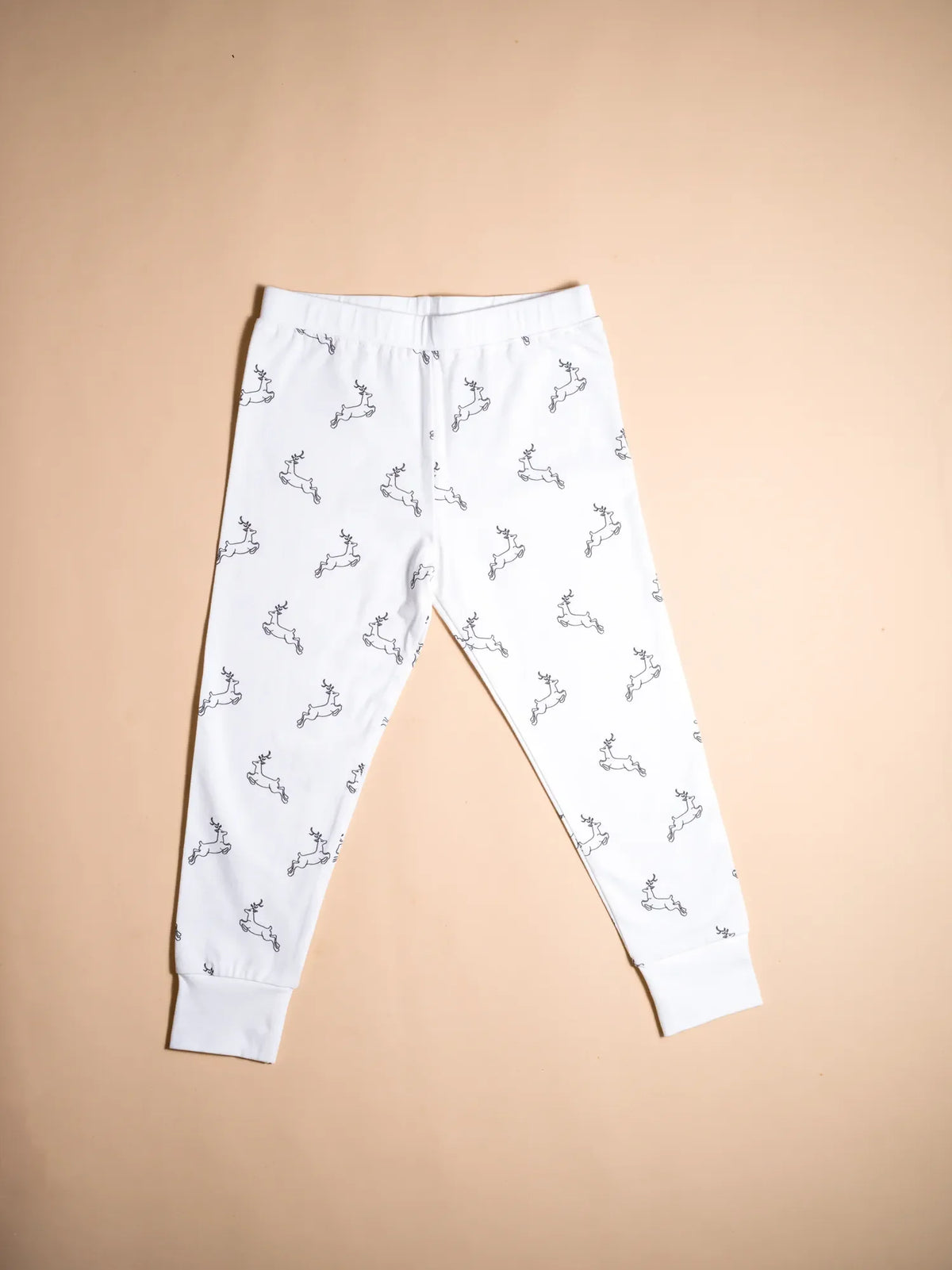 KendiKids Uhuru Pajama Set — running gazelle print in white