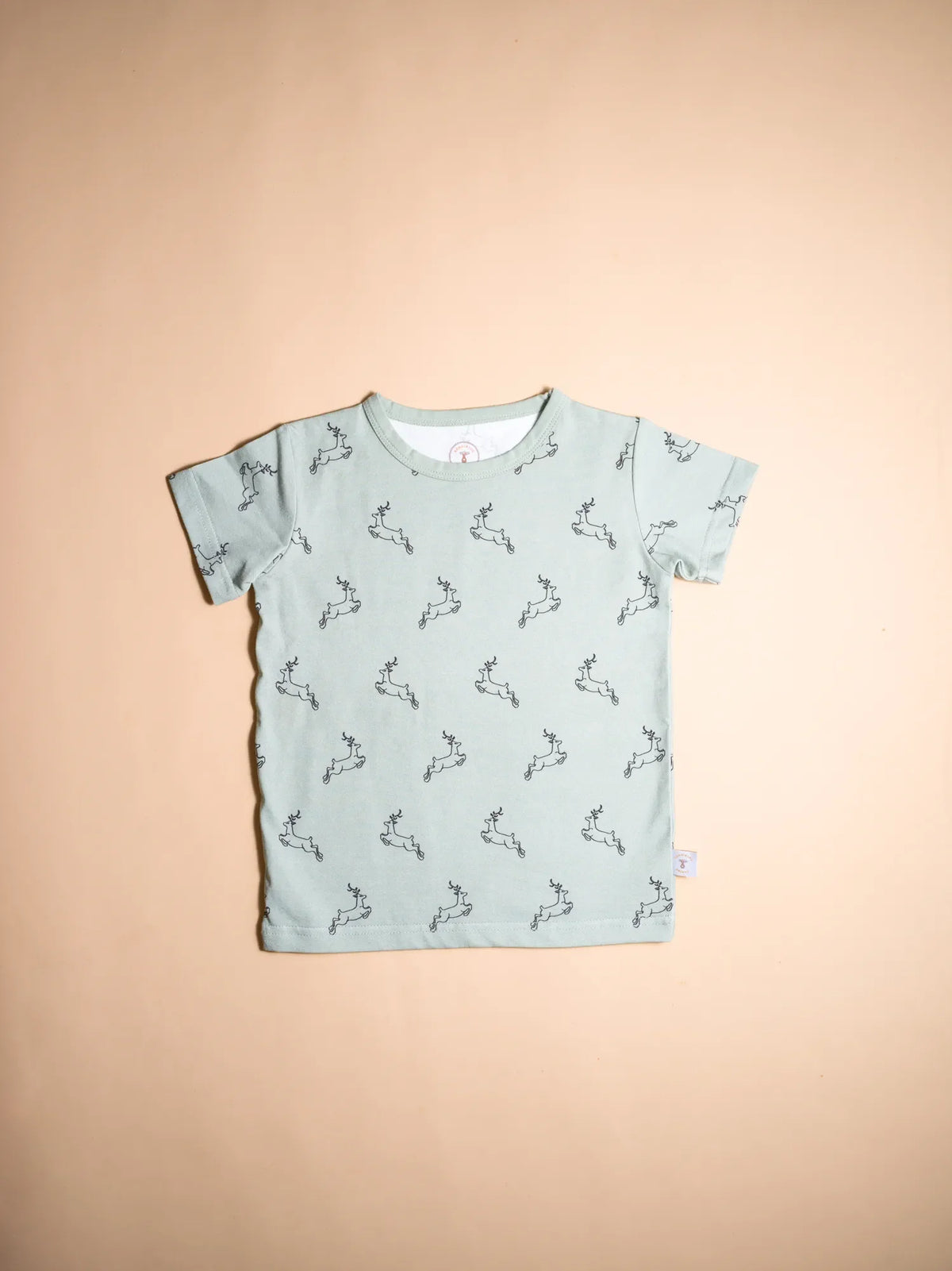 KendiKids Uhuru Sage Set — running gazelle print in soft sage
