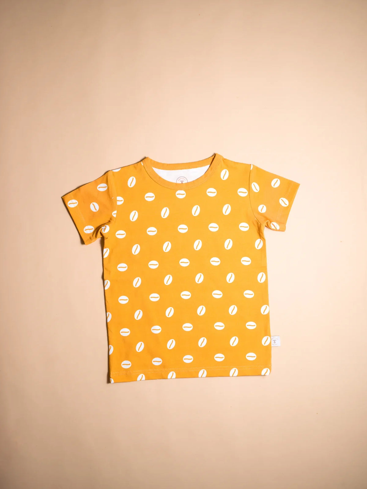 KendiKids Baraka Set — cowrie shell print in white on golden mustard