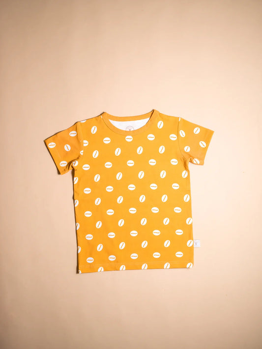 KendiKids Baraka Set — cowrie shell print in white on golden mustard
