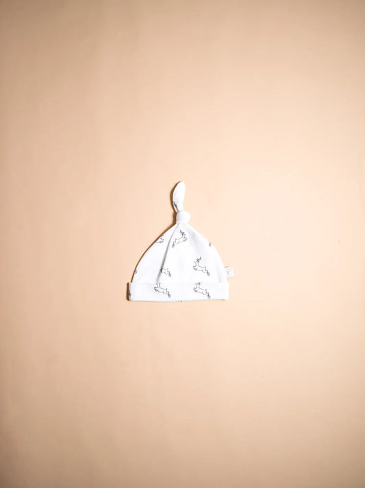 KendiKids Uhuru Knot Hat — running gazelle print in white
